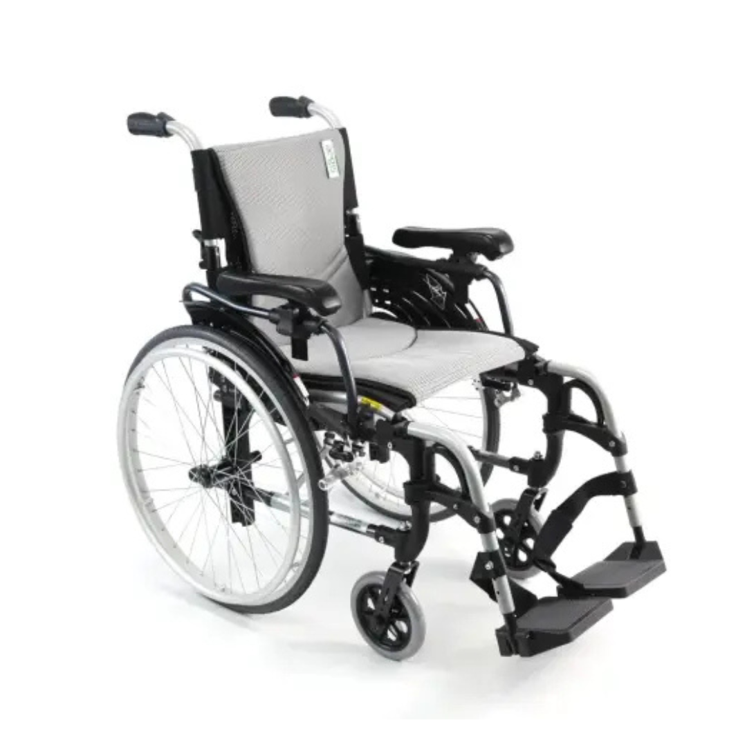 The Karman S-Ergo 305 Ultra Lightweight Ergonomic Wheelchair features a silver frame with gray seat and backrest, large rear wheels with hand rims, smaller front swivel wheels, ergonomic footrests, and armrests for enhanced mobility comfort.