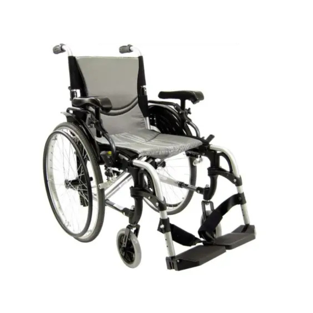 The Karman S-Ergo 305 Ultra Lightweight Ergonomic Wheelchair features a gray fabric seat and backrest, adjustable seat height, large rear wheels with hand rims, smaller front caster wheels, armrests, footrests, and a metallic frame for long-term mobility and support.
