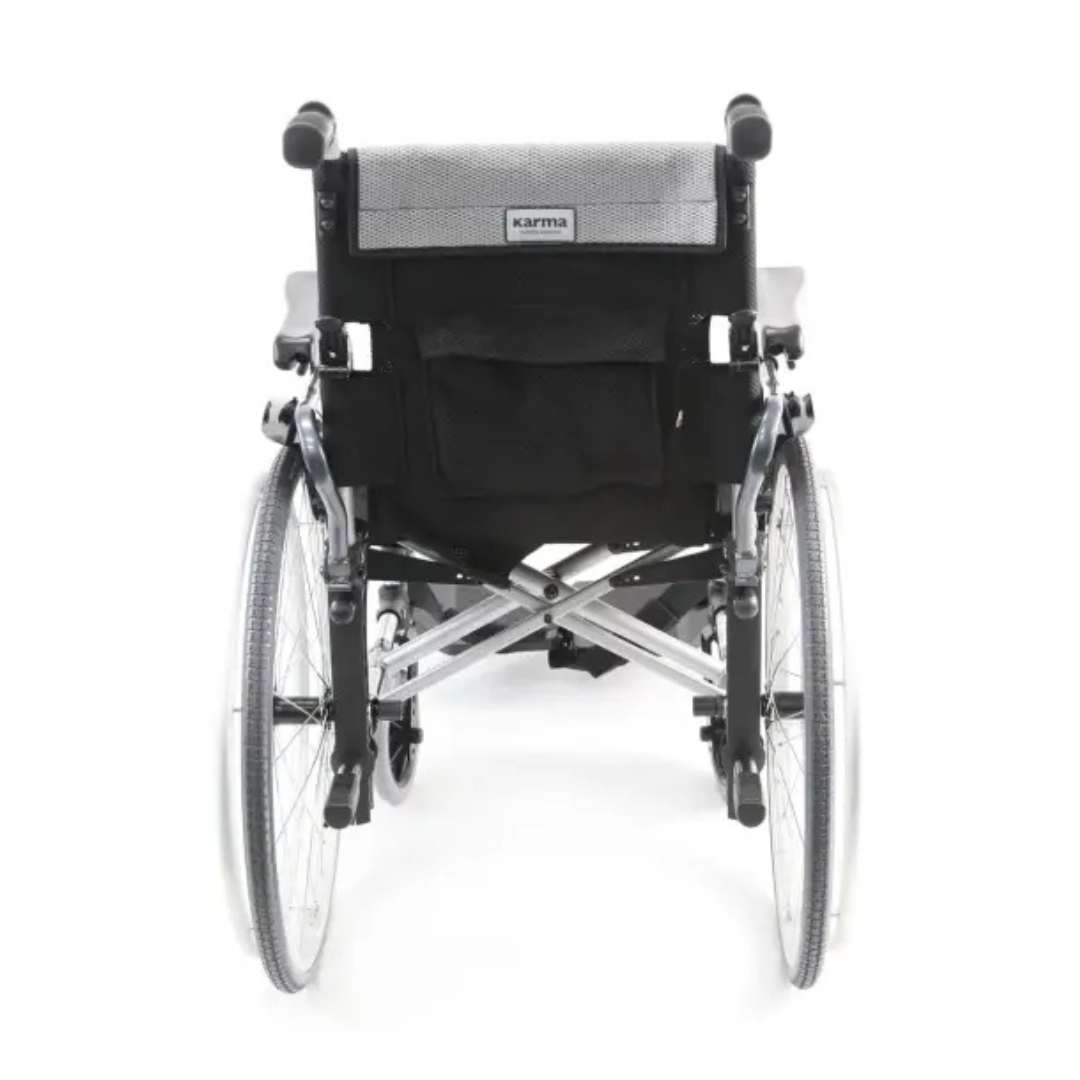 The Karman S-Ergo 305 Ultra Lightweight Ergonomic Wheelchair, shown from the rear in black and silver, is an ideal long-term mobility aid with large rear wheels, small front wheels, a cross-braced frame, a gray backrest, and a black pocket for storage.