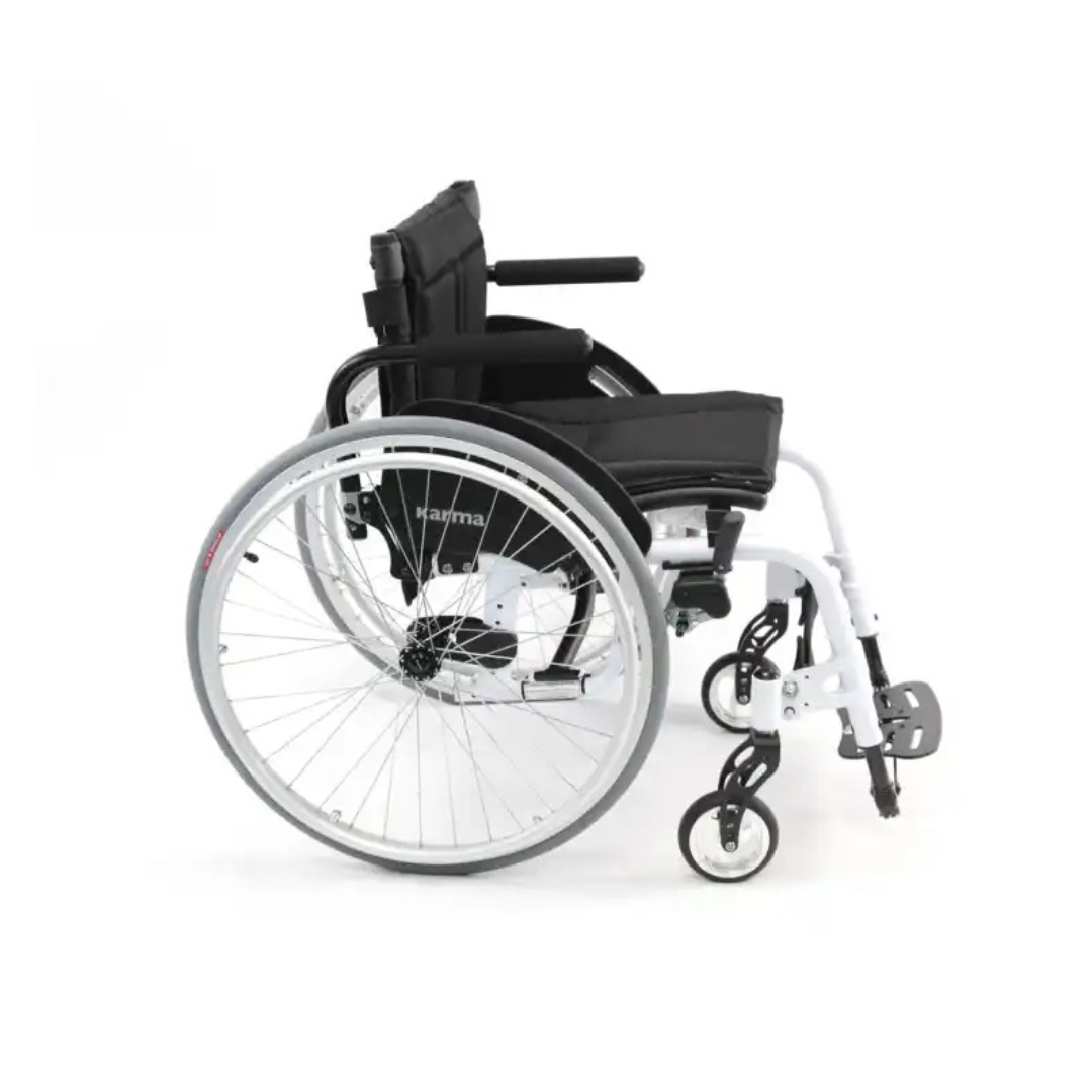 The Karman S-Ergo ATX Active Wheelchair, weighing just 26 lbs, showcases an ergonomic design with a black seat and large silver wheels against a white background. Its small, adjustable front wheels and sturdy frame offer an excellent strength-to-weight ratio.
