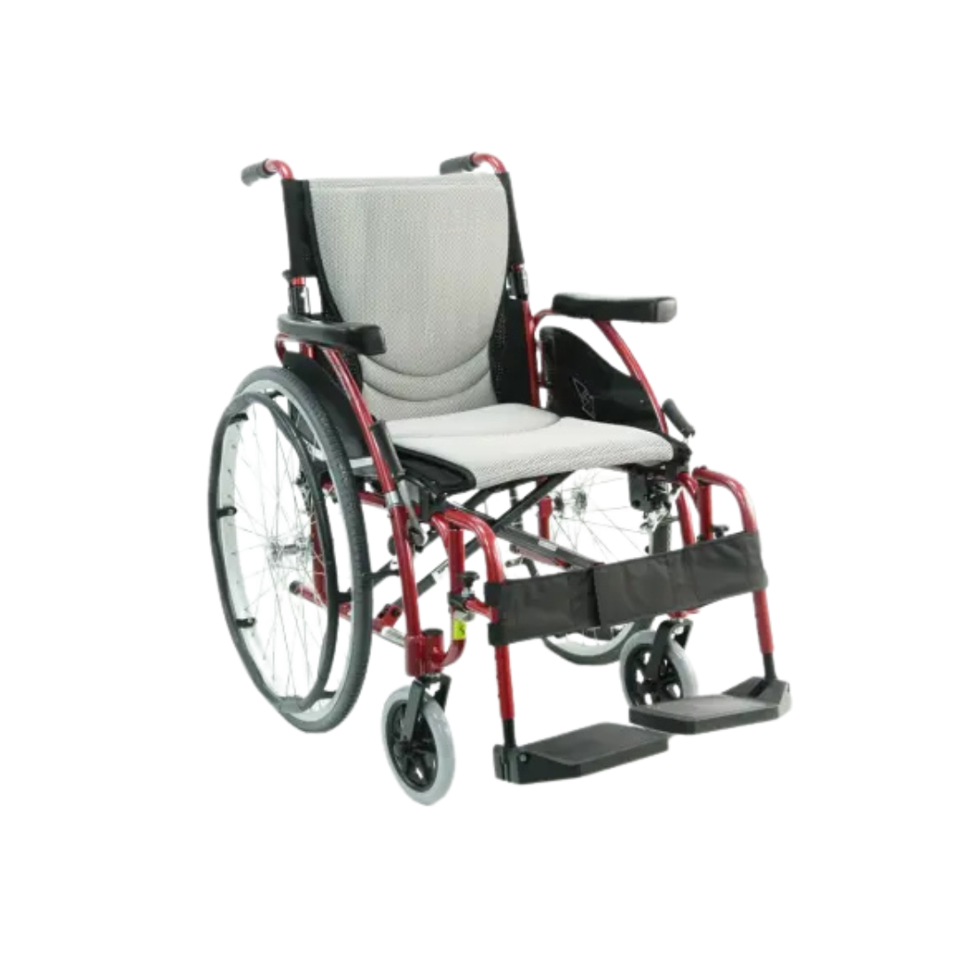 The Karman S-Ergo 125 is a red and black manual wheelchair with two large rear wheels, two smaller front wheels, a grey cushioned ergonomic seat for pressure relief, armrests, and footrests. Its metallic frame is designed for simplicity and function, offering an ultra-lightweight choice.
