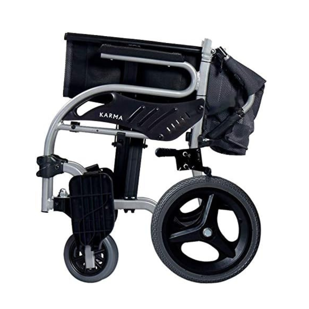 The Karman Healthcare STAR 2 Lightweight Folding Transport Chair features a black fabric seat, silver aircraft-grade aluminum frame, and large rear wheels for easy transport and storage.