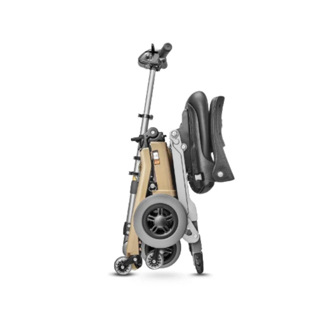 The FreeRider Luggie Elite Travel Scooter, with its compact beige frame and black wheels, stands upright on a white background, highlighting its slim, foldable design for easy portability—ideal for effortless travel.