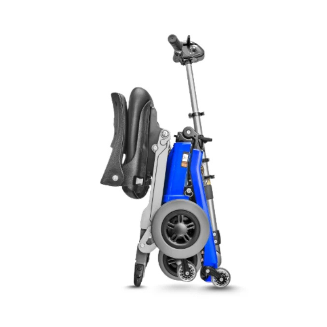 The FreeRider Luggie Elite Travel Scooter, featuring a compact foldable design, blue frame, black seat, and gray wheels, is shown upright and folded against a white background.