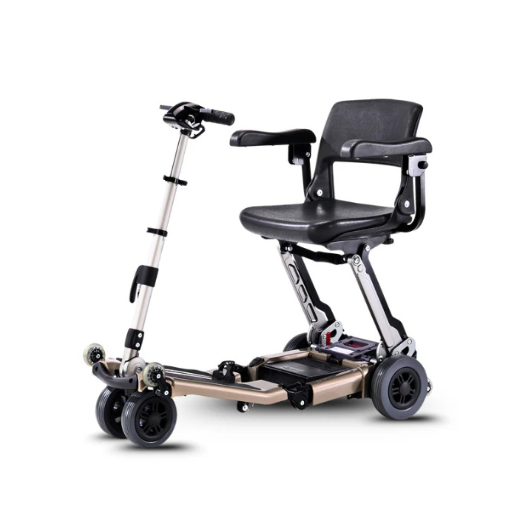 The FreeRider Luggie Elite Travel Scooter is a lightweight, foldable mobility scooter with a black seat, armrests, handlebars, and four small wheels—perfect for travel thanks to its compact design for easy transport and storage.