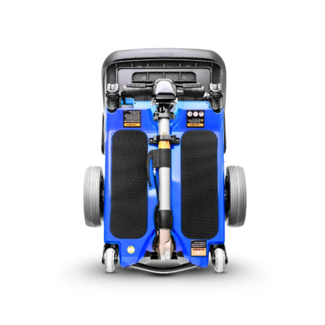 The FreeRider Luggie Elite Travel Scooter, shown folded compactly from above with handles, wheels, and footrests visible on a white background, is an airline-approved mobility scooter ideal for convenient travel.