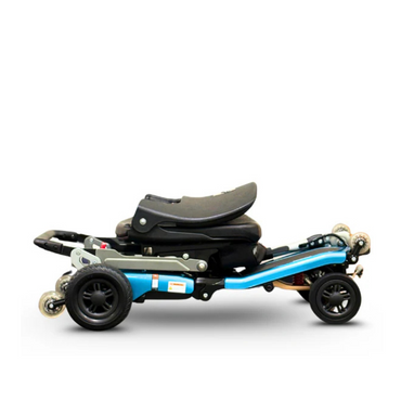 The FreeRider Luggie Super Plus 4 Travel Scooter, shown in compact blue and folded with its seat and frame collapsed, is a four-wheel scooter designed for easy transportation and storage.