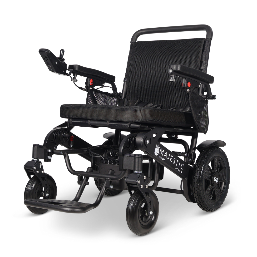 The ComfyGo Majestic 440 HD PLUS Bariatric Portable Powerchair is a black, heavy-duty, travel-approved electric wheelchair with large rear wheels, mesh seat and backrest, padded armrests, footrest, and left-arm controls.