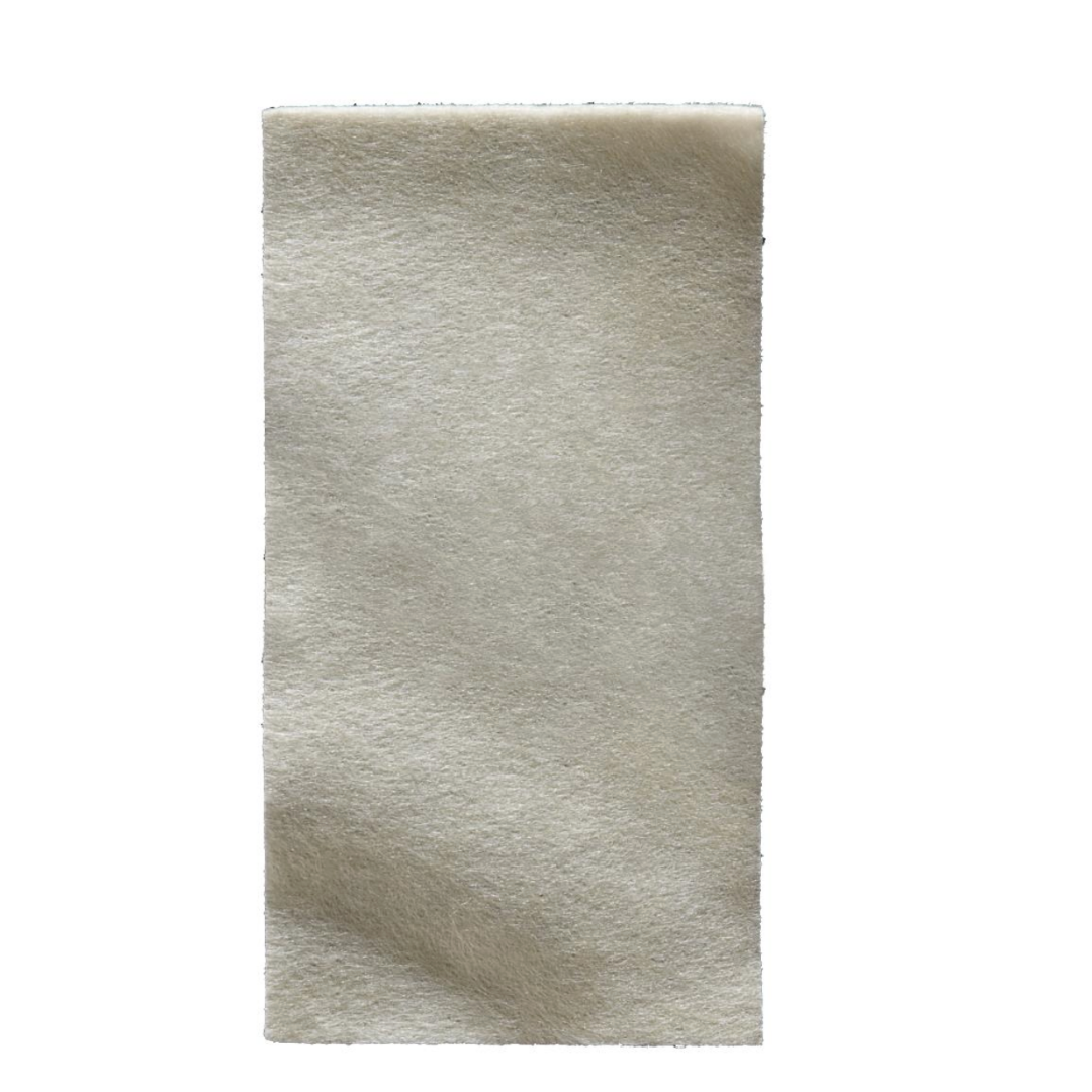 An off-white rectangular felt piece with a fuzzy texture, similar to the material in Maxorb II Alginate Wound Dressings - Highly Absorbant, appears on a plain white background.