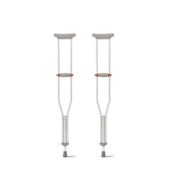 Medline Aluminum Crutches with Red Dot Hand Grip feature gray underarm pads and rubber tips, plus push-button height adjustment. They stand upright on a white background.