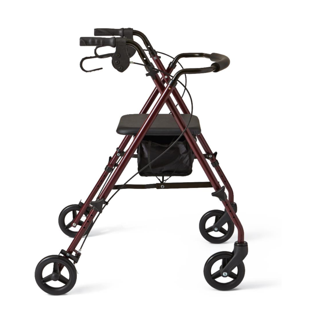 The Medline Basic Lightweight Steel Folding Rollator comes in red and features four wheels, a padded seat, height-adjustable handlebars with brakes, a compact folding design, and an under-seat storage bag. Its displayed on a white background.