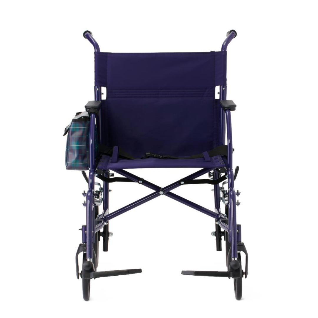 The Medline Designer High-Performance Transport Chair in purple is shown from the back, with a plaid side bag on one armrest and two small rear wheels visible, designed for comfortable mobility with a durable steel frame.