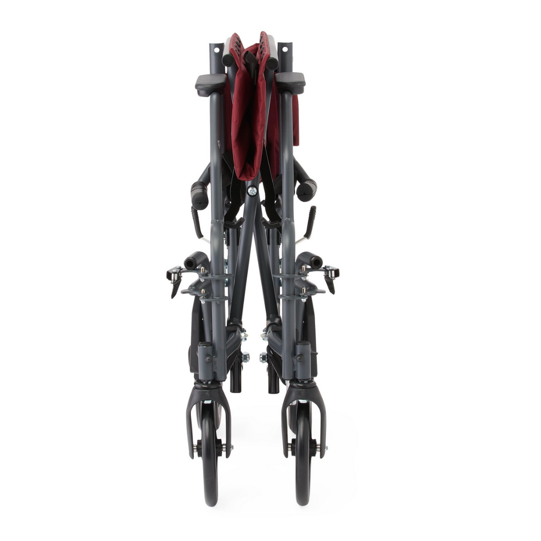 The Medline Designer High-Performance Transport Chair, shown folded from the front with wheels close and footrests up, highlights a compact, portable design and a durable steel frame in red and black.