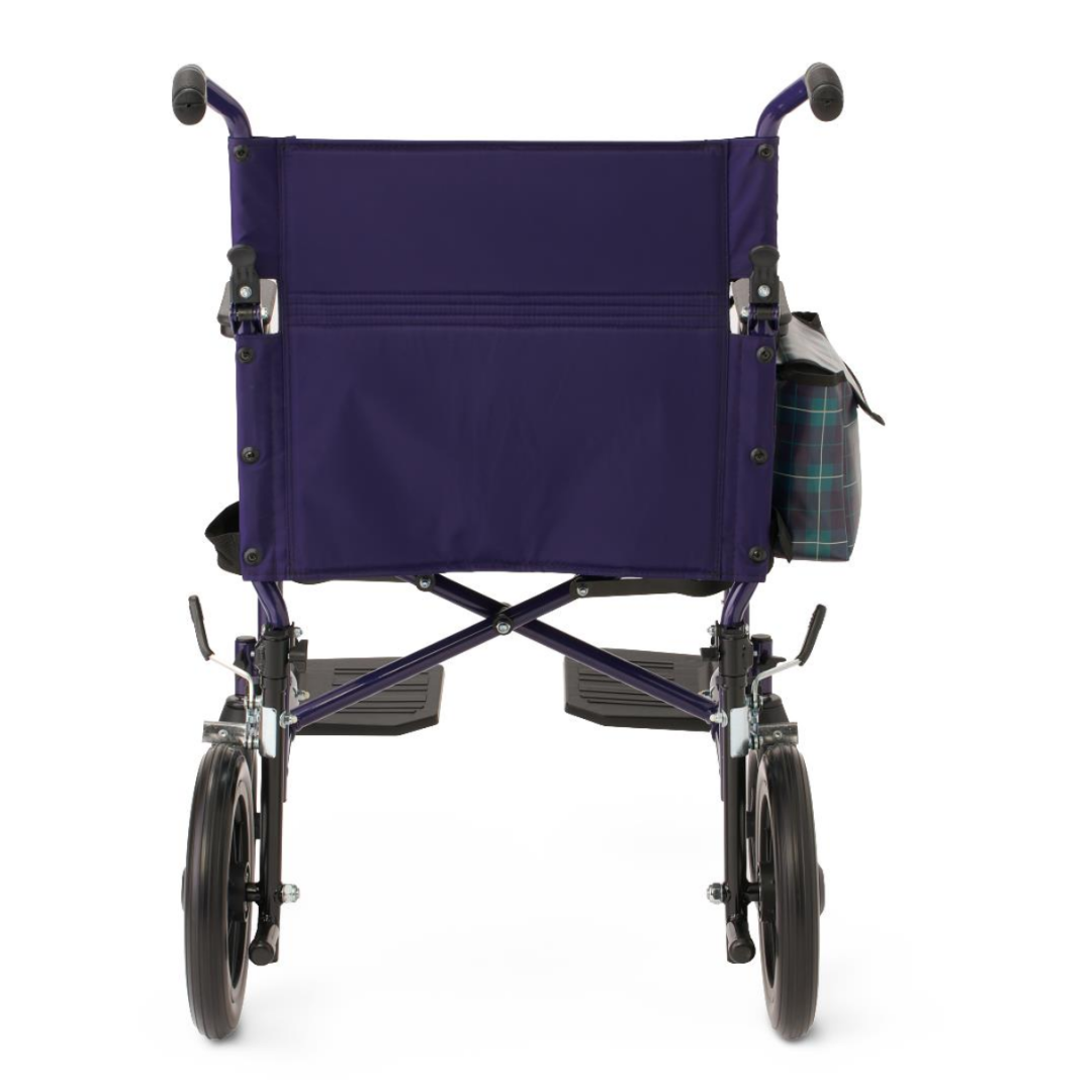 A rear view of the Medline Designer High-Performance Transport Chair in purple features large black wheels, dual footrests, a plaid-patterned side bag on the right armrest, and a sturdy steel frame for comfortable mobility.