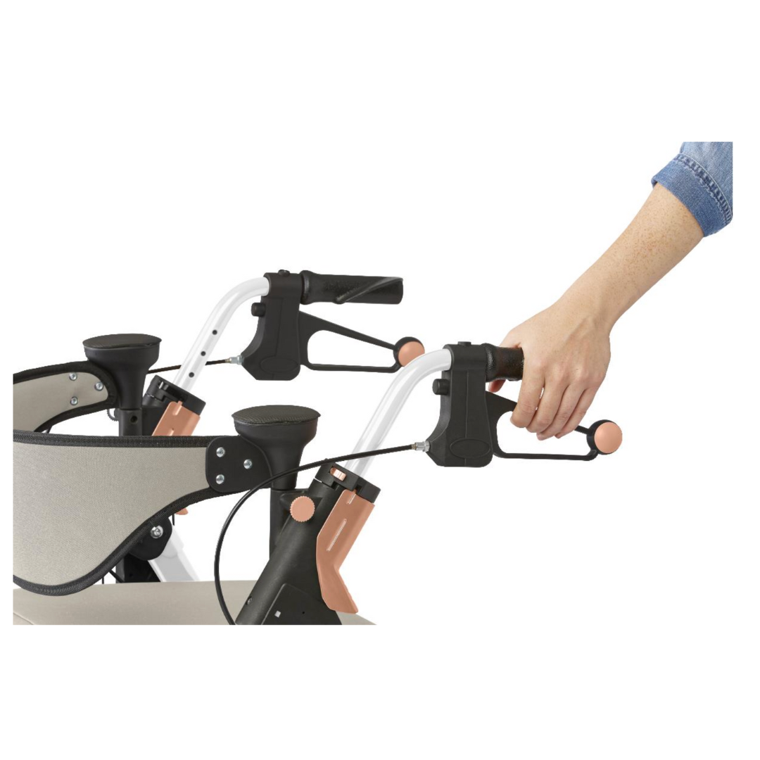 Someone adjusts the handbrake of a Medline Empower Rollator with Microban, featuring ergonomic handles and a sturdy frame. A hand turns a knob on the handle, enhancing comfort and stability for mobility assistance against the plain white background.