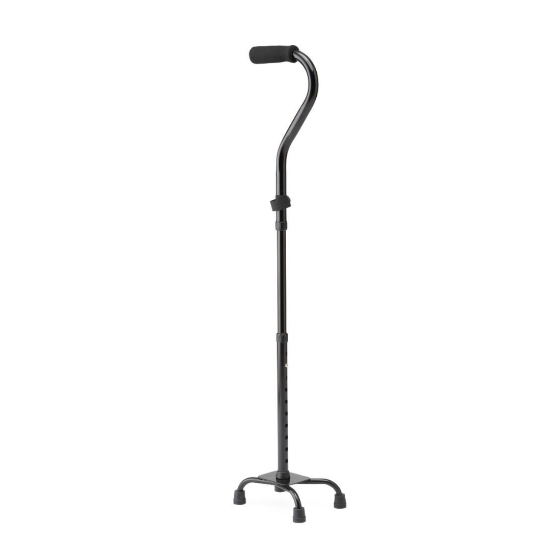 The Medline Folding Aluminum Quad Cane with Small Base, in black, features an adjustable height, a curved foam handle, and skid-resistant tips on its four-pronged base for excellent stability and support.