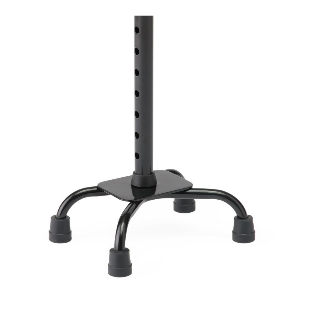The image shows the Medline Folding Aluminum Quad Cane with Small Base, featuring a black finish, four skid-resistant rubber tips for stability, and a height-adjustable pole for reliable support.