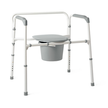 The Medline Bariatric Folding Commode features an adjustable white and gray design with a heavy-duty steel frame, seat cover, and bucket. Its extra wide 24 seat accommodates up to 650 lb. It has adjustable height, durable armrests, and legs for support, making it ideal as a bedside commode option.