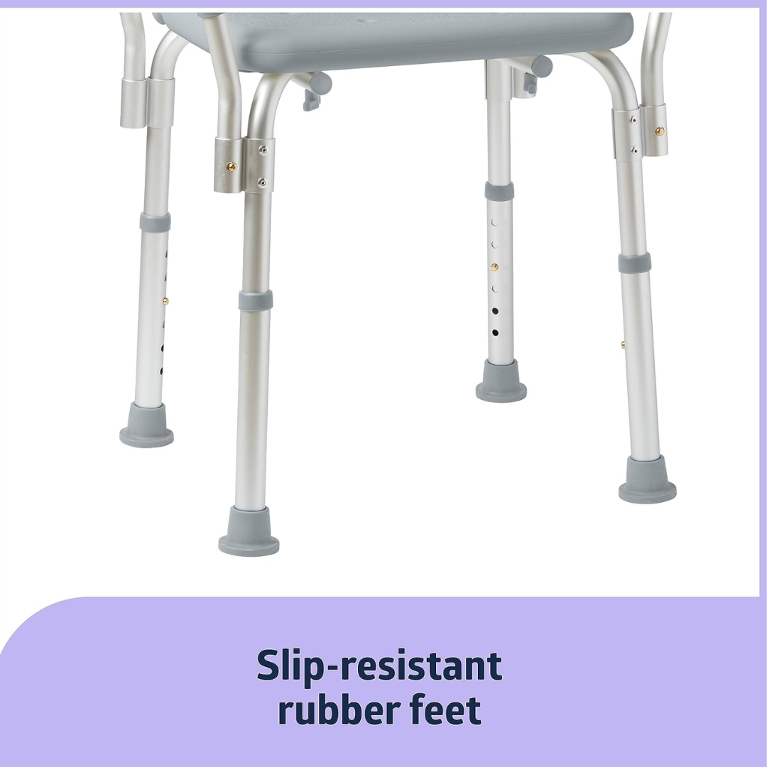 Close-up of the Medline Shower Chair with Backrest and Padded Armrests showcasing adjustable metal legs with height-adjustment holes, non-slip rubber feet for added safety, and a gray seat.