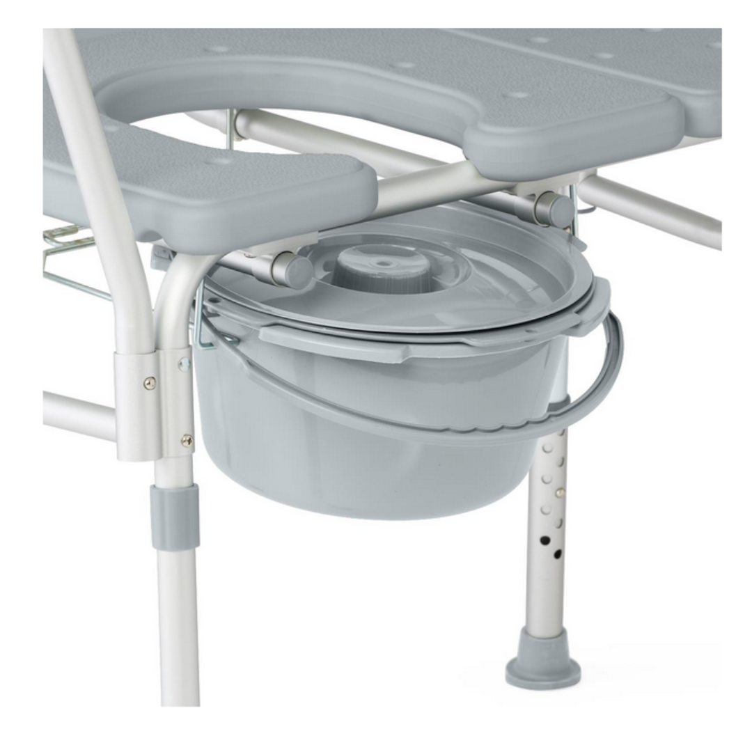 The Medline Bariatric Combination Transfer Bench and Commode is a gray chair with a built-in, removable bucket and lid. It’s designed for mobility challenges, featuring adjustable-height legs with rubber tips for enhanced stability and safer transfers.