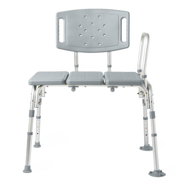 The Medline Bariatric Knockdown Transfer Bench is an adjustable gray chair with a backrest, armrests, and suction cup feet for stability. Its designed for safe bathroom use with a perforated seat for drainage. Its heavy-duty aluminum construction supports up to 550 lb.