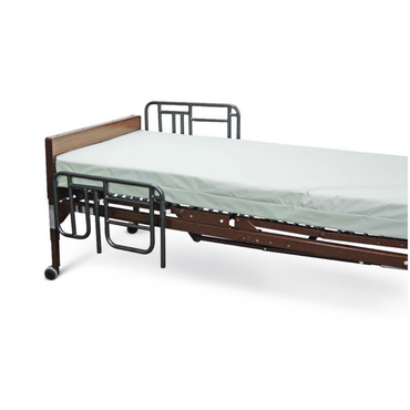 The Medline Bed Rails for Medline Homecare Beds provide patient safety, featuring sturdy metal rails, a thin white mattress, a wooden headboard, and wheels on one end for easy mobility and installation.