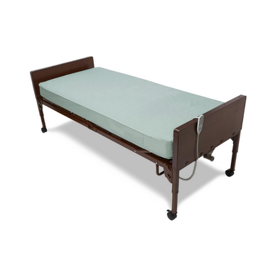 The Medline Innerspring Mattress For Homecare Beds is a hospital-style adjustable bed with a waterproof, antimicrobial pale green mattress, brown wooden headboard and footboard, side remote control, and wheeled legs for easy mobility.