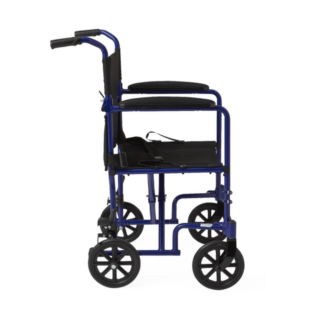Side view of the Medline Basic Aluminum Transport Chair in blue, featuring durable lightweight construction, four black wheels, foldable footrests, and padded handles. The black seat and backrest highlight its compact design for easy mobility.