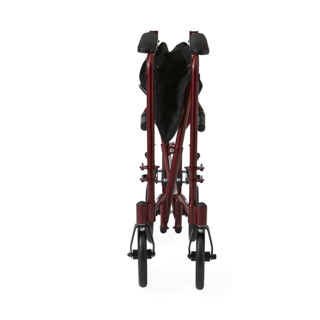 The Medline Basic Aluminum Transport Chair, red and compact with front view, features durable black seating material, two small wheels, and fixed full-length black armrests.