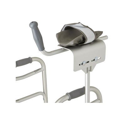 A close-up of a Medline Walker Platform Attachment shows its gray high armrest with a strap, mounted on the side rail of a silver walker with padded hand grips for enhanced forearm support.