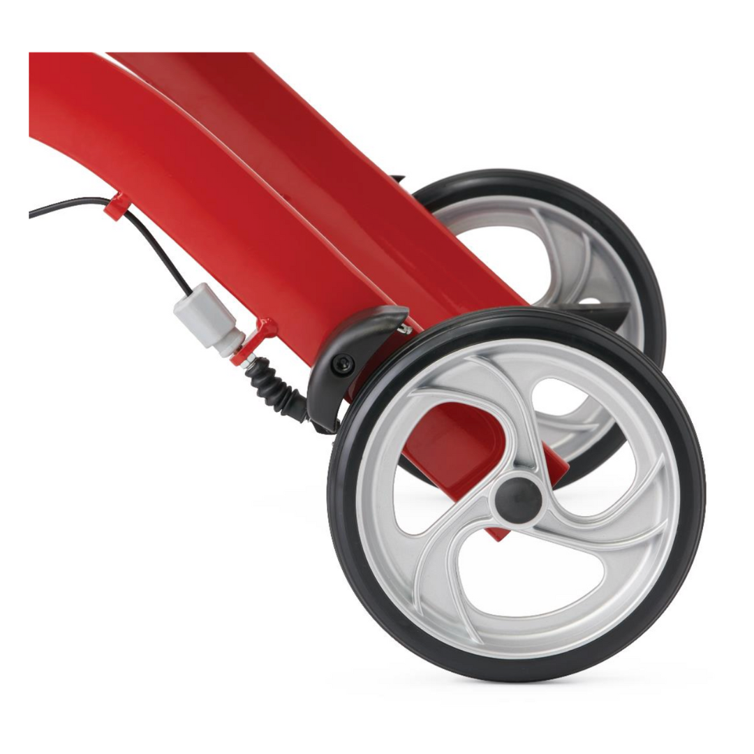 Close-up of the Medline European-Style Aluminum Ultralite Rollators rear wheel and frame highlights its enhanced mobility. The wheel features a metallic silver finish with a black rubber tire. A brake cable connects to a small black mechanism above the wheel, giving it a sleek design.