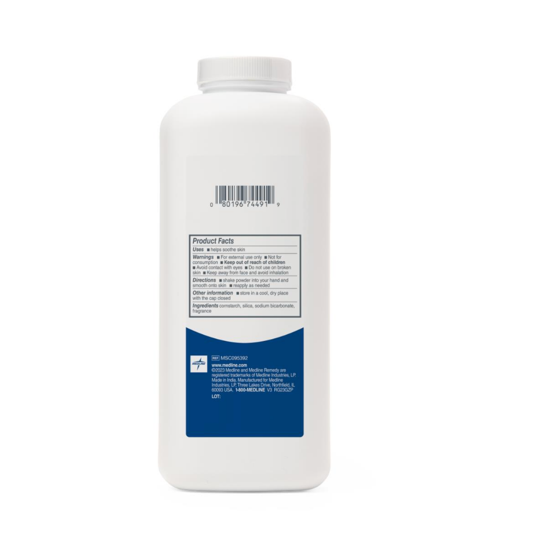 A white plastic bottle shown from the back displays a barcode near the top and a blue and white label reading “Product Facts.” Medline Remedy Essentials Cornstarch Body Powder is talc-free and lists instructions for use as a skin protectant.
