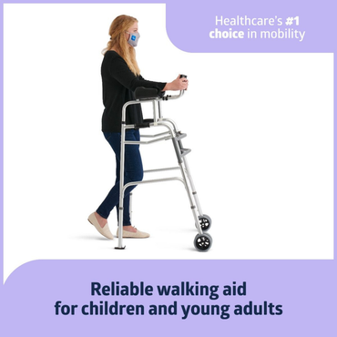A young woman wearing a mask uses the Medline Upright Folding Walker with Wheels, a lightweight aluminum walking aid designed for children and young adults—healthcare’s top choice for reliable mobility support.