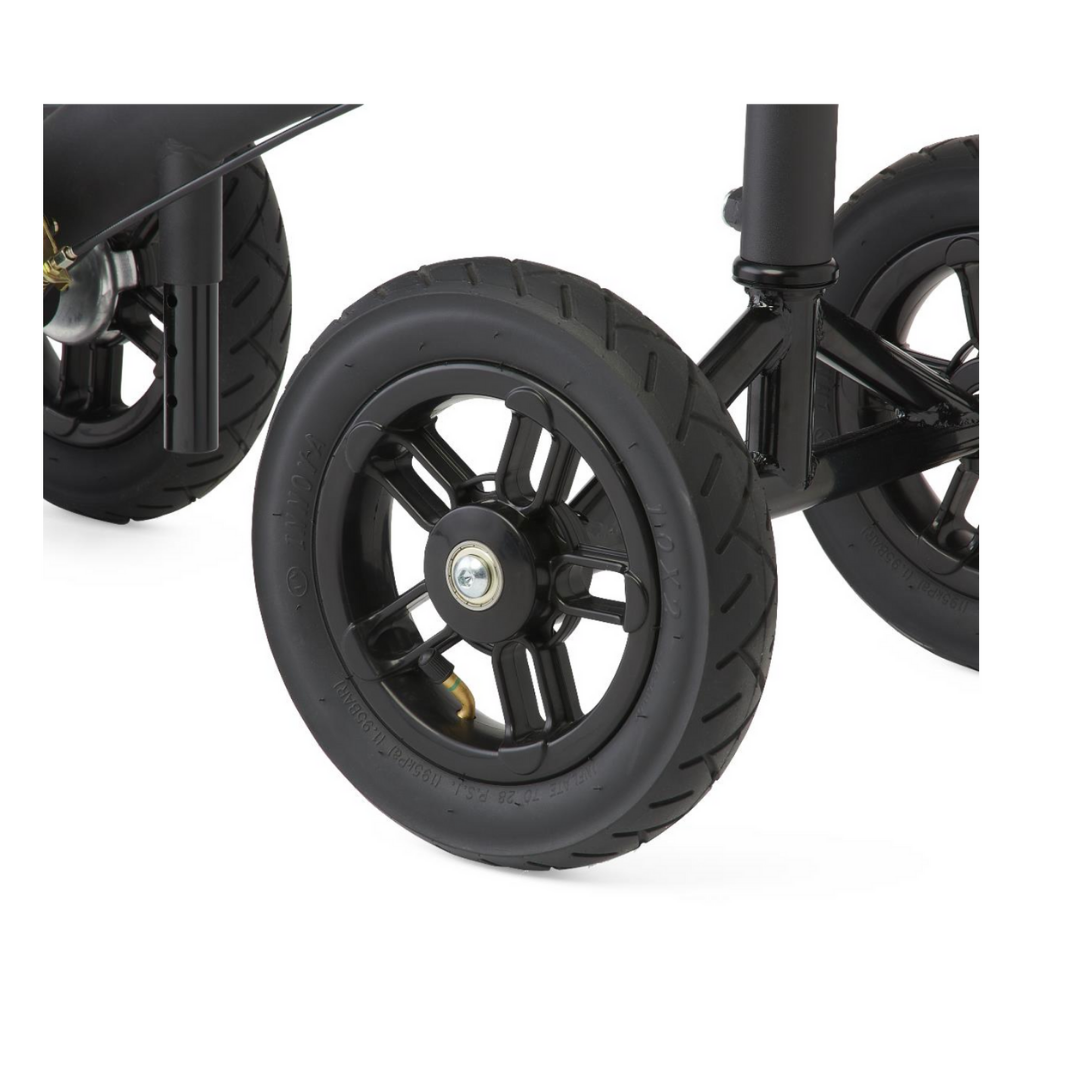 Close-up of two black, spoked all-terrain wheels attached to the metal frame of a Medline All-Terrain Portable Knee Walker, shown on a white background.