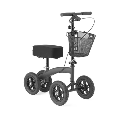 The Medline All-Terrain Portable Knee Walker features a black frame, all-terrain wheels, a padded memory foam seat, handlebars with a brake, and a wire basket on the front.