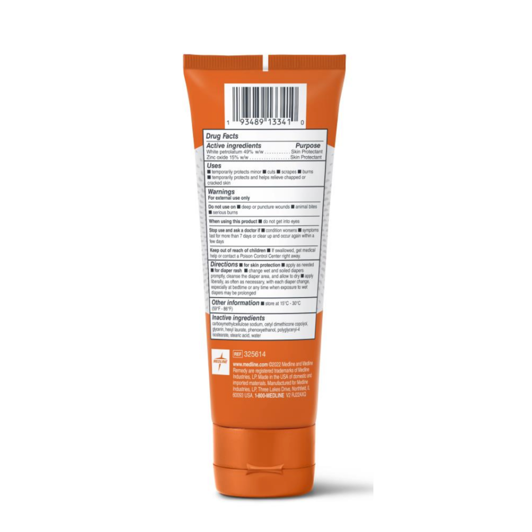 The Medline Remedy Specialized Extra Thick Zinc Oxide Paste comes in an orange tube with a white cap and barcode, featuring a drug facts label on the back listing active ingredients, uses, directions, and warnings. Ideal for sensitive skin and stands upright.