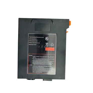 The Battery for The Miracle Mobility Palladium 8500 Powerchair is a rectangular black 24V 12Ah lithium pack with a spec label and orange and black connectors—perfect as a replacement for your Miracle Mobility Palladium 8500 powerchair.