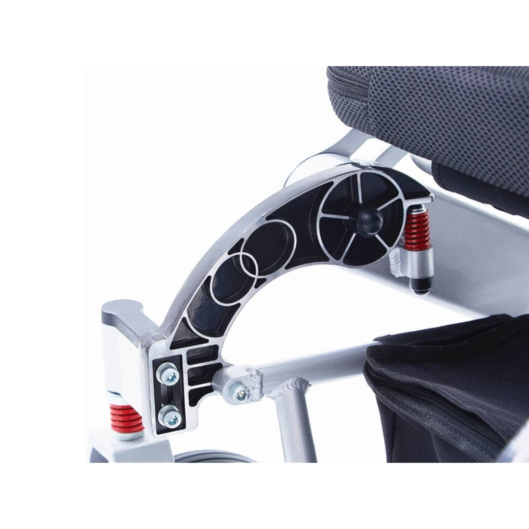 Close-up of the Miracle Mobility Platinum 8000 Bariatric Portable Powerchair’s folding metal frame, showing bolts, springs, and textured black padding that highlight its suspension system and sturdy construction details.