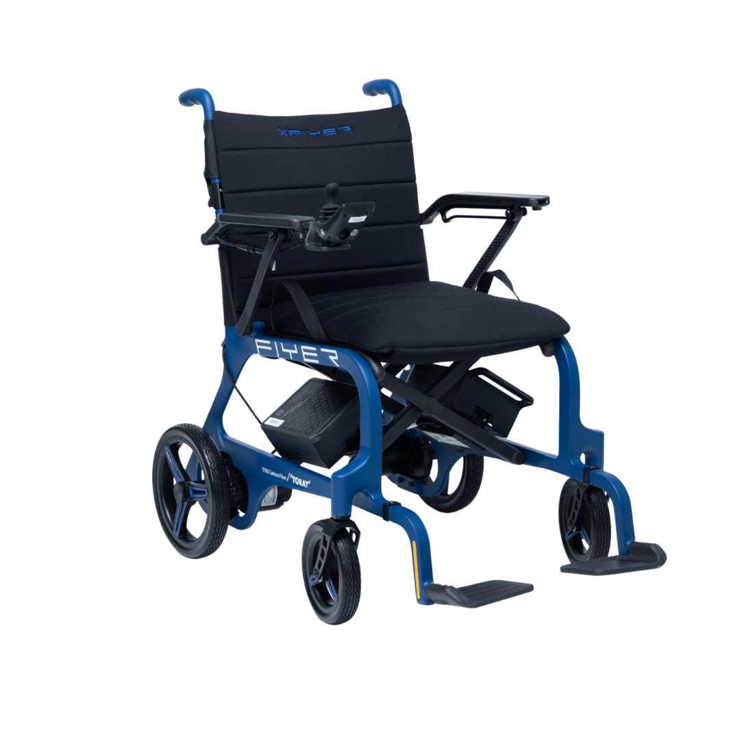 The Monarch Flyer Ultra-Lite Carbon Powerchair is shown in blue and black with large rear wheels, small front wheels, padded seat and backrest, right-side joystick, armrests, dual footrests—specs and warranty details available.