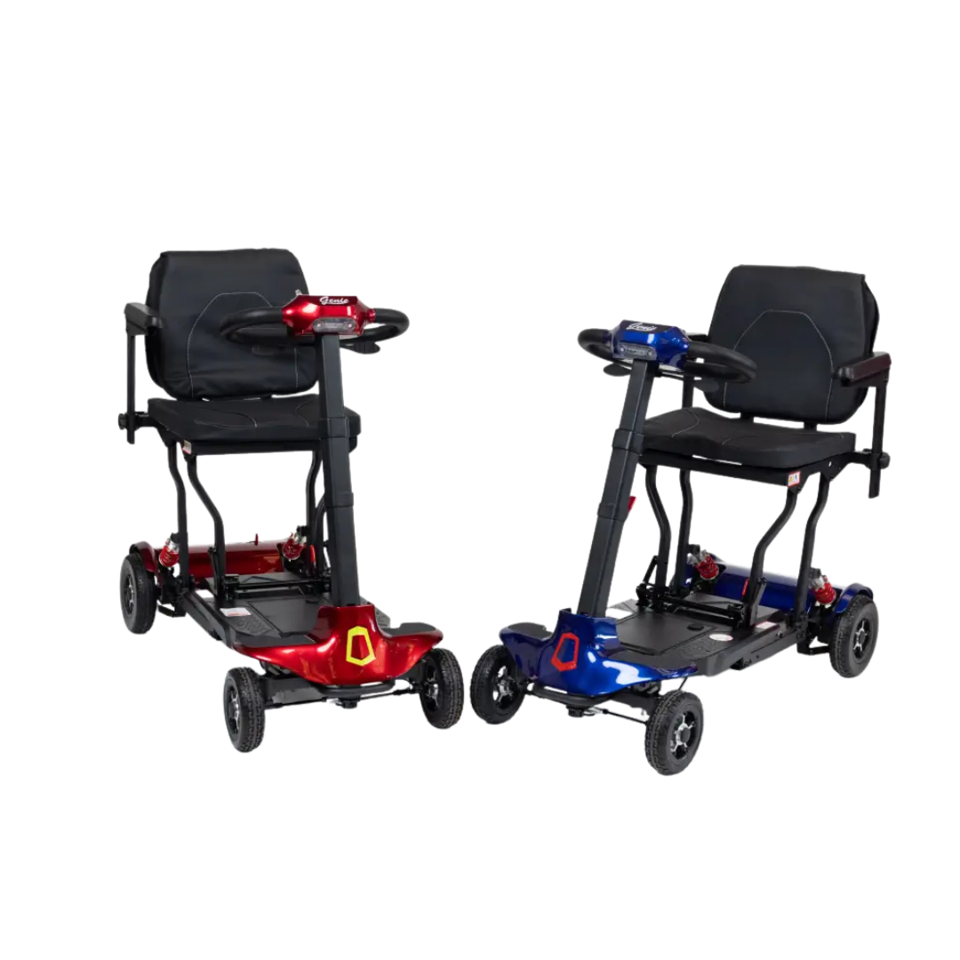 Two Monarch Genie Lightweight Portable Scooters, one red and one blue, are side by side on a white background. Each scooter has a black cushioned seat and four wheels. The text shown is CSS code, not a product description.