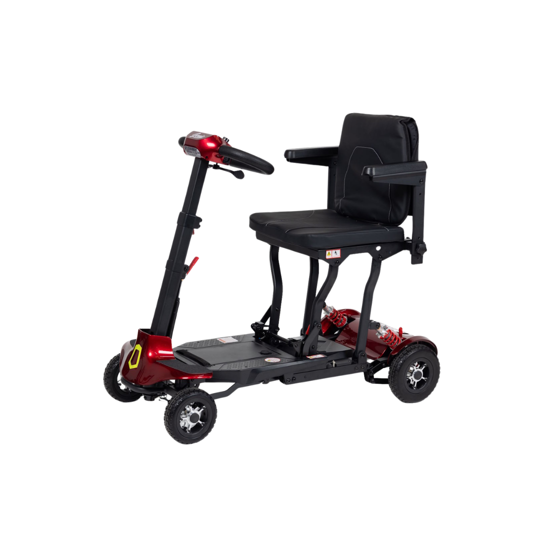 The Monarch Genie Auto Folding Portable Scooter is a red and black four-wheeled mobility scooter featuring a padded seat with armrests, handlebars, and footrests, designed for personal transportation.