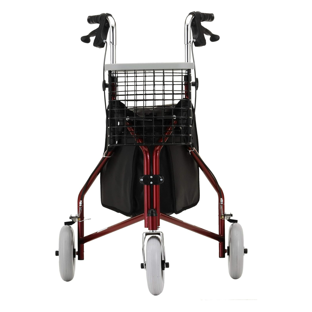 A front view of the Nova Medical 4900 Traveler 3 Wheel Rollator Walker in red, featuring black handlebars, feather-touch brakes, a wire basket, black pouch, and white all-terrain 8” wheels for mobility assistance.