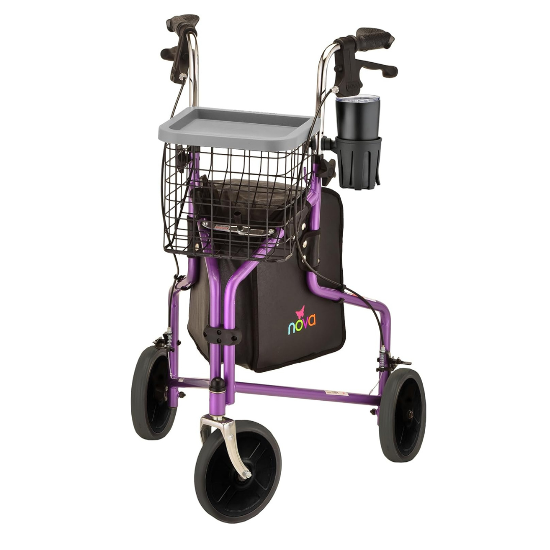 The Nova Medical 4900 Traveler 3 Wheel Rollator Walker features a purple frame, black handles, all-terrain 8” wheels, a wire basket, gray top tray, black cup holder, feather-touch hand brakes, and a storage pouch attached to the frame.
