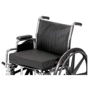 The Nova Gel & Memory Foam Mobility Cushions are shown on a black wheelchair with padded armrests and large rear wheels, set against a white background.