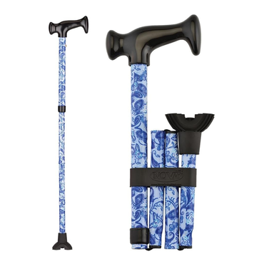 The Nova Folding Walking Cane with Wood Grip Handle & Quad Tip features a blue and white floral pattern, ergonomic wood handle, quad-tip base, and folds compactly for easy travel. Shown fully extended and folded for portability.