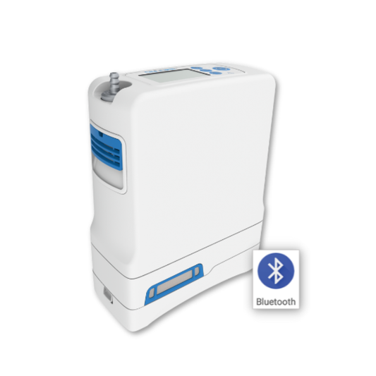 The OxyGo FIT Ultra Compact Portable Oxygen Concentrator is white and blue with a display screen, buttons, and a Bluetooth symbol indicating wireless connectivity.