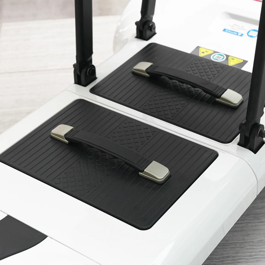 Close-up of two black rubber footrests with handles on a Paiseec Mobility Scooter D3, showcasing textured surfaces and silver hardware on a light wooden floor. The Paiseec Mobility Scooter D3 Battery is also available as a compatible accessory.