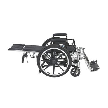 The Drive Pediatric Viper Plus Hydraulic Reclining Wheelchair, shown in black from the side on a white background, features an extended leg rest, armrest, heavy-duty chrome steel frame, and elevated leg rest for superior support and durability.