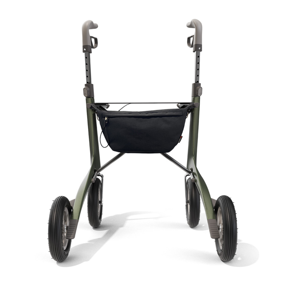 The Pocket Bag for byACRE Carbon Fiber Rollators is a modern black rollator bag attached to a lightweight walker with four large wheels and adjustable handles, shown from the front on a white background.
