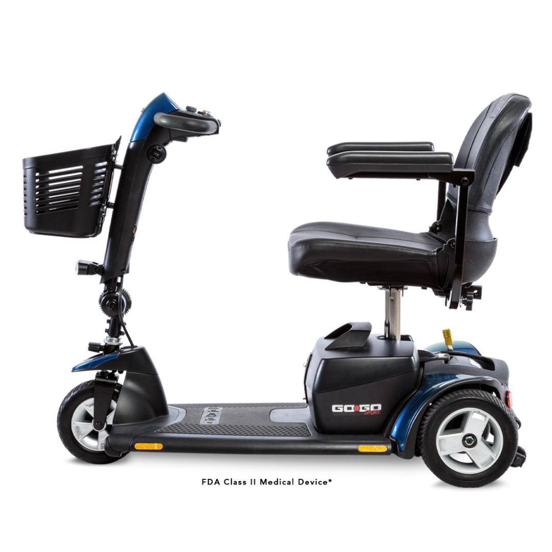 The Pride Go Go® Sport 3-Wheel Scooter, shown in blue and black, is an FDA Class II Medical Device ideal for lightweight transport. It includes a comfy seat with armrests, a front basket, and customizable handlebars for easy steering.
